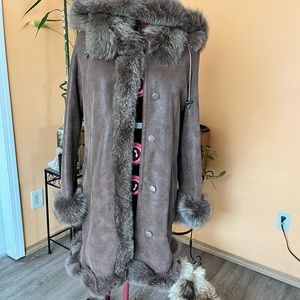 Very cozy and warm suede sheep coat. New.Size XL